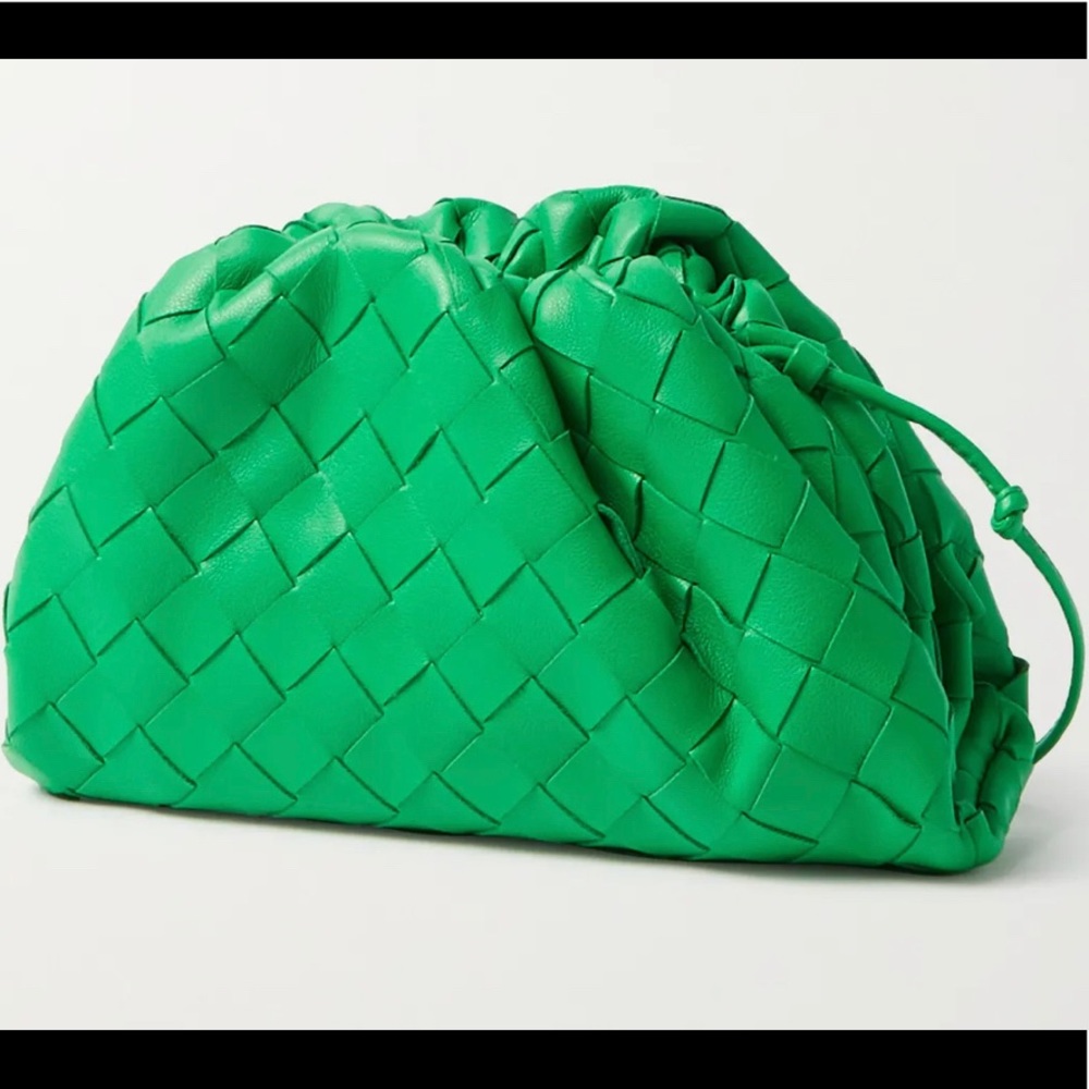 BOTTEGA VENETA
The Pouch mini intrecciato leather clutch w/ cross body.